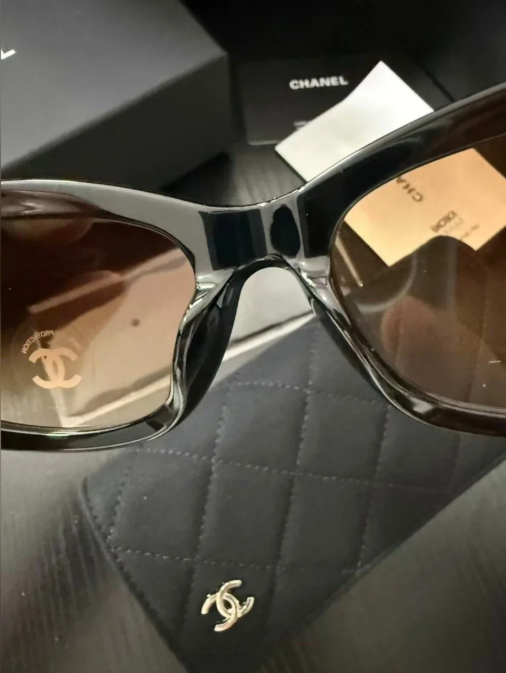 CHANEL Black Frame Sunglasses with Brown Gradient Lenses
